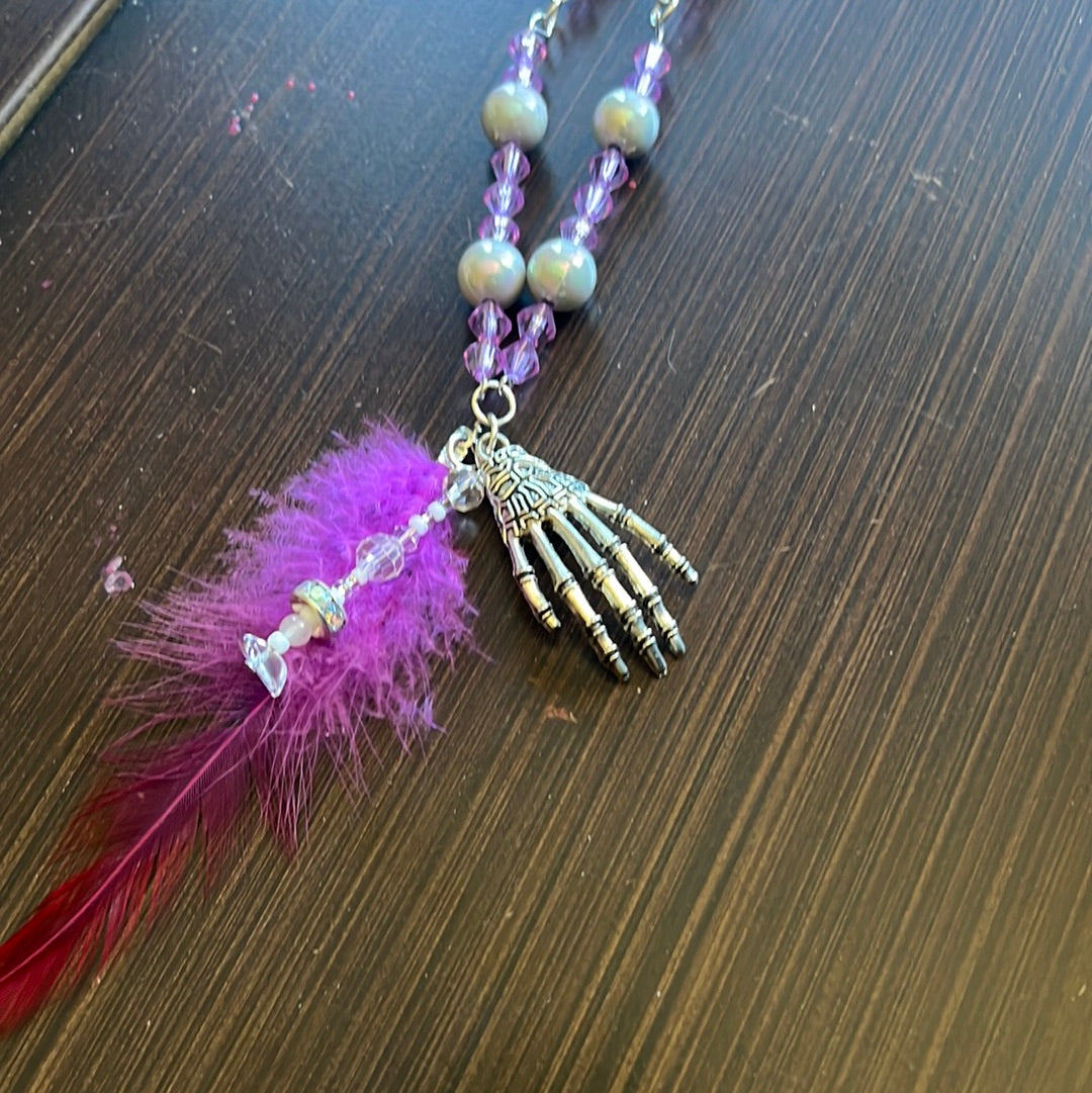 Skeleton hand necklace