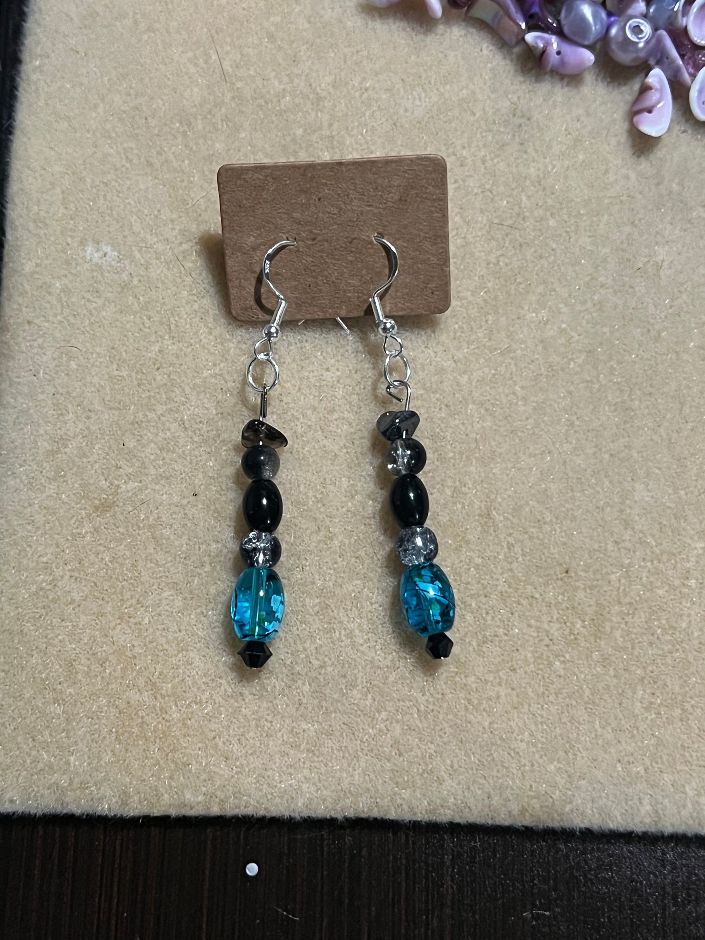 Teal and black earrings